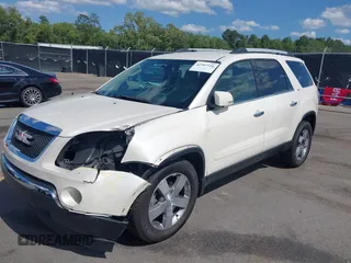 2011 GMC Acadia SLT2 with VIN 1GKKRSED1BJ235224, listed as a IAAI auction lot 42307216 with 158,126 mi miles and . Bid and sale history available at DreamBid. Image 2.
