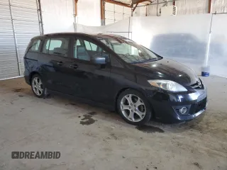 2010 Mazda 5 Sport with VIN JM1CR2W33A0366990, listed as a Copart auction lot 49799535 with 256,933 mi miles and Salvage Title. Bid and sale history available at DreamBid. Image 4.
