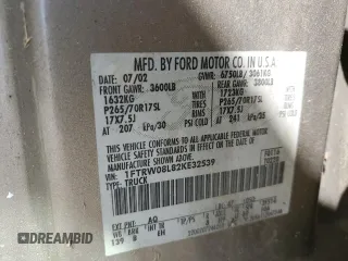 2002 Ford F-150 XLT with VIN 1FTRW08L82KE32539, listed as a Copart auction lot 51017735 with 269,434 mi miles and Salvage Title. Bid and sale history available at carsss.com. Image 12.