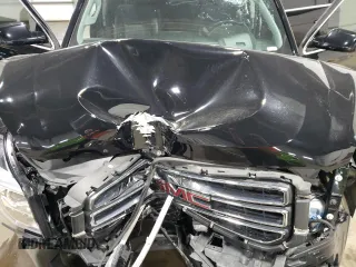 2019 GMC Yukon SLT Standard Edition with VIN 1GKS2DKC4KR393344, listed as a Copart auction lot 51942674 with 76,147 mi miles. Bid and sale history available at carsss.com. Image 13.