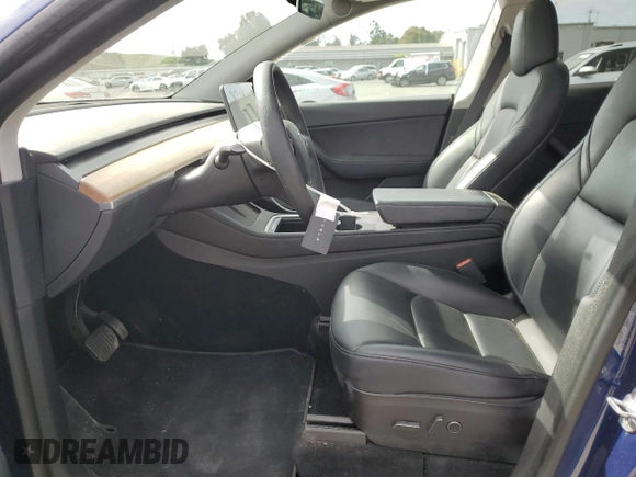 2021 Tesla Model Y Long Range with VIN 5YJYGDEEXMF192447, listed as a Copart auction lot 53550055 with 65,673 mi miles and Salvage Title. Bid and sale history available at DreamBid. Image 7.