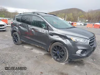 2017 Ford Escape Titanium with VIN 1FMCU0JD1HUA75308, listed as a IAAI auction lot 41966334 with 129,044 mi miles. Bid and sale history available at carsss.com. Image 1.