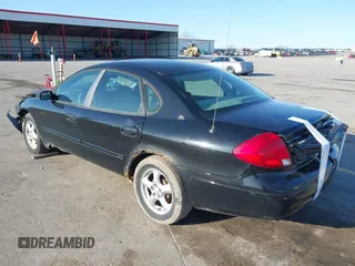 2002 Ford Taurus SE Standard with VIN 1FAFP53U72G132285, listed as a IAAI auction lot 41965332 with 214,966 mi miles and . Bid and sale history available at DreamBid. Image 3.