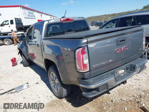 2019 GMC Canyon 4WD SLE with VIN 1GTG6CEN2K1102111, listed as a IAAI auction lot 41938971 with 156,260 mi miles and . Bid and sale history available at carsss.com. Image 3.