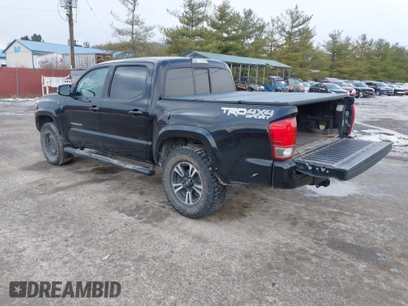 2016 Toyota Tacoma SR with VIN 3TMCZ5AN2GM027945, listed as a IAAI auction lot 41446277 with 51,781 mi miles and . Bid and sale history available at DreamBid. Image 3.