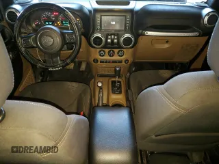 2017 Jeep Wrangler Sahara z VIN 1C4AJWBG6HL582839, wystawiony jako Copart lot #52049725 z przebiegiem 143 544 mil mil oraz Szkoda całkowita • Salvage title. Historia ofert i sprzedaży dostępna na DreamBid. Obrazek 8.