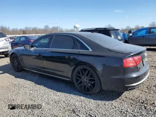 2014 Audi A8 4.0T с VIN WAUR2AFDXEN005361, выставлен на аукционе Copart как лот 46828285 с пробегом 106 984 миль миль и Списание • Salvage title. История ставок и продаж доступна на DreamBid. Изображение 2.