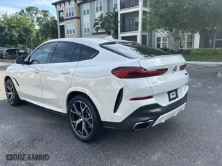 2020 BMW X6 M50i with VIN 5UXCY8C03L9B98266, listed as a Copart auction lot 54259735 with 44,544 mi miles and Clean Title. Bid and sale history available at carsss.com. Image 3.