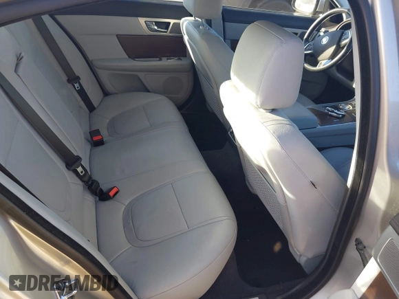 2013 Jaguar XF I4 RWD with VIN SAJWA0ES3DPU01767, listed as a IAAI auction lot 41704883 with 54,797 mi miles. Bid and sale history available at carsss.com. Image 8.