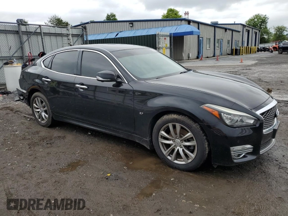 2015 Infiniti Q70 with VIN JN1BY1APXFM541211, listed as a Copart auction lot 55721515 with 134,025 mi miles and Non repairable. Bid and sale history available at DreamBid. Image 4.