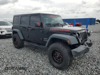 2018 Jeep Wrangler Unlimited Sport S with VIN 1C4BJWDG0JL818800, listed as a Copart auction lot 56648505 with 114,011 mi miles and Salvage Title. Bid and sale history available at DreamBid. Image 4.