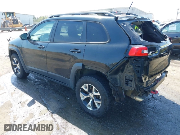 2014 Jeep Cherokee Trailhawk with VIN 1C4PJMBB6EW162303, listed as a IAAI auction lot 41910167 with 133,669 mi miles. Bid and sale history available at carsss.com. Image 3.