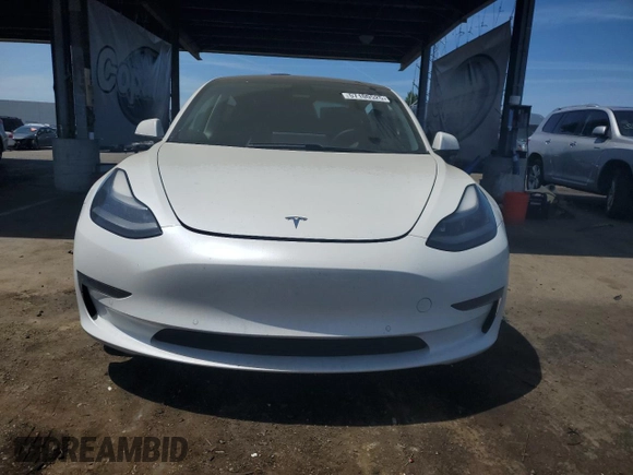 2021 Tesla Model 3 Standard Range Plus z VIN 5YJ3E1EA7MF078241, wystawiony jako Copart lot #57100525 z przebiegiem 56 700 mil mil oraz Szkoda całkowita • Salvage title. Historia ofert i sprzedaży dostępna na DreamBid. Obrazek 5.