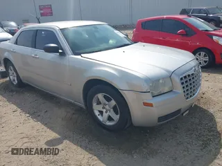2006 Chrysler 300 with VIN 2C3KA43R96H505406, listed as a IAAI auction lot 42047014 with 257,628 mi miles. Bid and sale history available at carsss.com. Image 1.