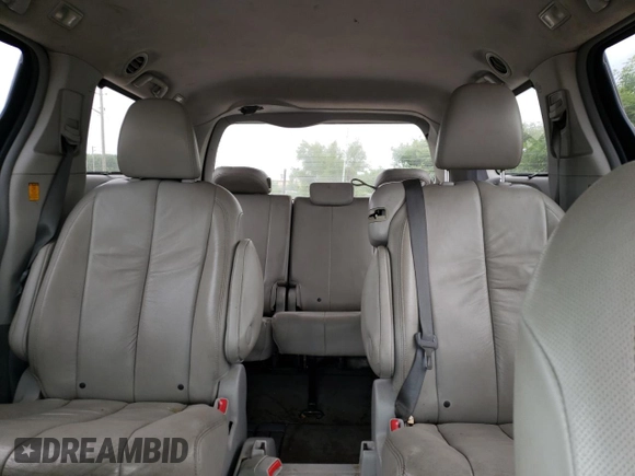 2012 Toyota Sienna XLE AAS with VIN 5TDYK3DC7CS216061, listed as a Copart auction lot 60596715 with 112,713 mi miles and Salvage title. Bid and sale history available at DreamBid. Image 10.