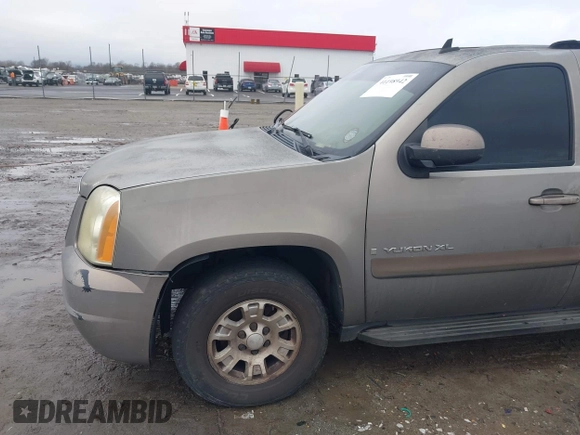 2007 GMC Yukon XL SLT with VIN 1GKFK16327J266852, listed as a IAAI auction lot 41198942 with 243,905 mi miles. Bid and sale history available at carsss.com. Image 11.