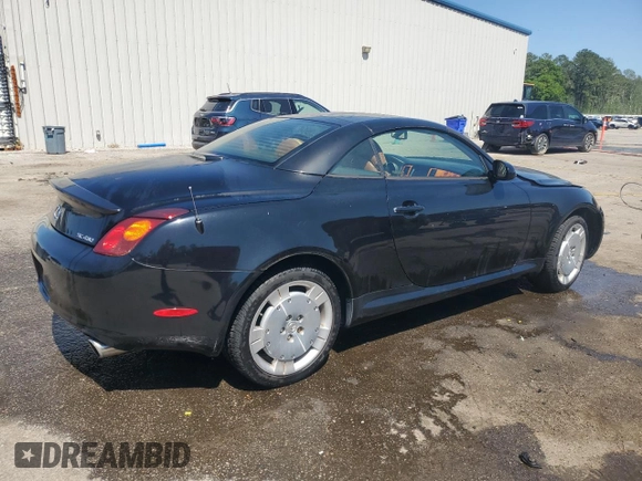 2003 Lexus SC 430 with VIN JTHFN48Y730047333, listed as a Copart auction lot 52112085 with 106,750 mi miles and Salvage title. Bid and sale history available at DreamBid. Image 3.