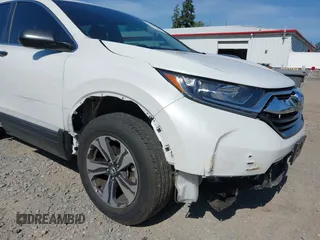 2019 Honda CR-V LX z VIN 5J6RW6H34KL001445, wystawiony jako IAAI lot #42369616 z przebiegiem 13 553 mil mil oraz . Historia ofert i sprzedaży dostępna na DreamBid. Obrazek 6.