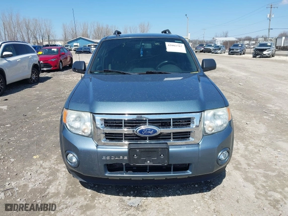 2010 Ford Escape XLT with VIN 1FMCU0DGXAKD37821, listed as a IAAI auction lot 42002767 with 169,557 mi miles. Bid and sale history available at carsss.com. Image 6.