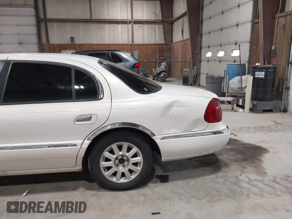 2001 Lincoln Continental with VIN 1LNHM97V81Y667328, listed as a IAAI auction lot 41730916 with 126,179 mi miles and . Bid and sale history available at DreamBid. Image 15.