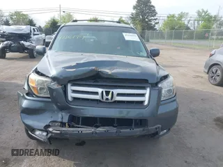 2006 Honda Pilot EX z VIN 5FNYF18456B023671, wystawiony jako IAAI lot #42116194 z przebiegiem 161 683 mil mil oraz . Historia ofert i sprzedaży dostępna na DreamBid. Obrazek 11.