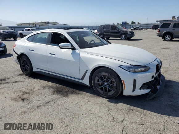 2022 BMW i4 eDrive40 with VIN WBY73AW09NFM42460, listed as a Copart auction lot 59141474 with 0 mi miles and Salvage Title. Bid and sale history available at carsss.com. Image 4.