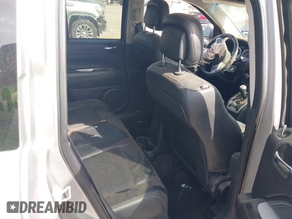 2016 Jeep Compass Latitude with VIN 1C4NJCEA7GD675742, listed as a IAAI auction lot 41877787 with 107,749 mi miles and . Bid and sale history available at DreamBid. Image 8.