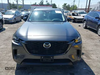 2025 Mazda CX-90 Premium Sport z VIN JM3KKCHAXS1206996, wystawiony jako IAAI lot #42086590 z przebiegiem 4 294 mil mil oraz . Historia ofert i sprzedaży dostępna na DreamBid. Obrazek 12.