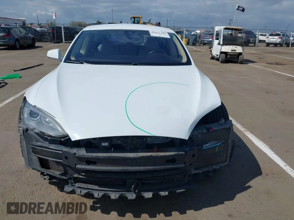 2014 Tesla Model S 60 with VIN 5YJSA1H10EFP56526, listed as a IAAI auction lot 41871784 with 143,361 mi miles and . Bid and sale history available at DreamBid. Image 13.