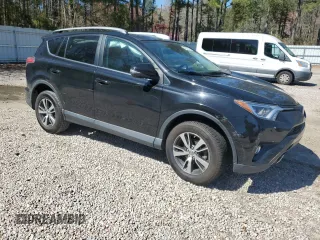 2018 Toyota RAV4 XLE with VIN 2T3WFREV7JW412348, listed as a Copart auction lot 49973215 with 127,661 mi miles and Salvage Title. Bid and sale history available at DreamBid. Image 4.