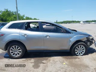 2011 Mazda CX-7 i Sport z VIN JM3ER2B55B0389115, wystawiony jako IAAI lot #42178894 z przebiegiem 237 552 mil mil oraz . Historia ofert i sprzedaży dostępna na DreamBid. Obrazek 13.