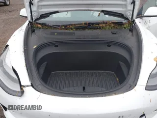 2023 Tesla Model 3 with VIN 5YJ3E1EA2PF626392, listed as a IAAI auction lot 42288413 with 25,605 mi miles and . Bid and sale history available at DreamBid. Image 10.