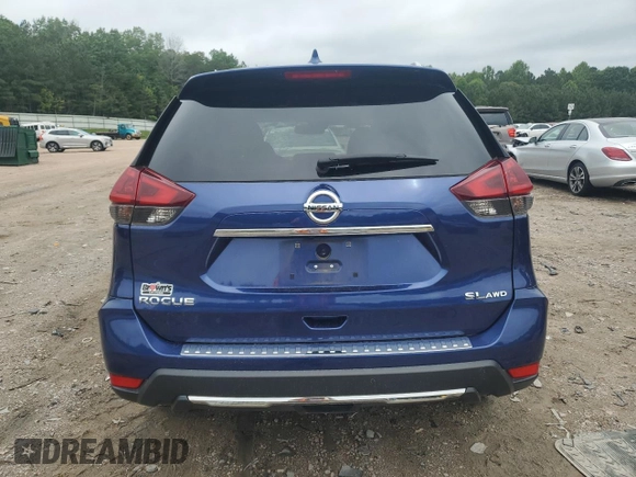 2018 Nissan Rogue SV z VIN 5N1AT2MV8JC852721, wystawiony jako Copart lot #58755385 z przebiegiem 69 454 mil mil oraz Szkoda całkowita • Salvage title. Historia ofert i sprzedaży dostępna na DreamBid. Obrazek 6.