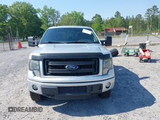 2013 Ford F-150 XL with VIN 1FTFW1ET0DFC85741, listed as a IAAI auction lot 42022221 with 156,509 mi miles. Bid and sale history available at carsss.com. Image 12.