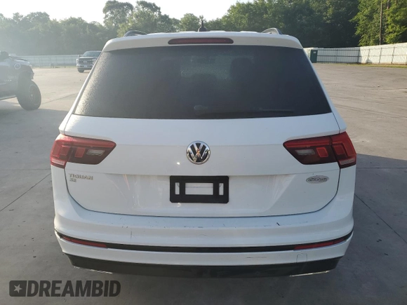2021 Volkswagen Tiguan SE z VIN 3VV3B7AX5MM136155, wystawiony jako Copart lot #56120395 z przebiegiem 59 421 mil mil oraz Szkoda całkowita • Salvage title. Historia ofert i sprzedaży dostępna na DreamBid. Obrazek 6.