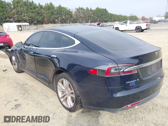 2014 Tesla Model S 60 with VIN 5YJSA1S12EFP42605, listed as a IAAI auction lot 40905031 with 68,155 mi miles and . Bid and sale history available at DreamBid. Image 3.
