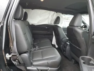 2019 Honda Passport Touring z VIN 5FNYF7H96KB000201, wystawiony jako Copart lot #73759134 z przebiegiem Nie podano mil oraz Szkoda całkowita • Salvage title. Historia ofert i sprzedaży dostępna na DreamBid. Obrazek 11.