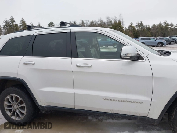 2014 Jeep Grand Cherokee Limited with VIN 1C4RJFBG7EC497622, listed as a IAAI auction lot 41667930 with 147,876 mi miles and . Bid and sale history available at DreamBid. Image 14.