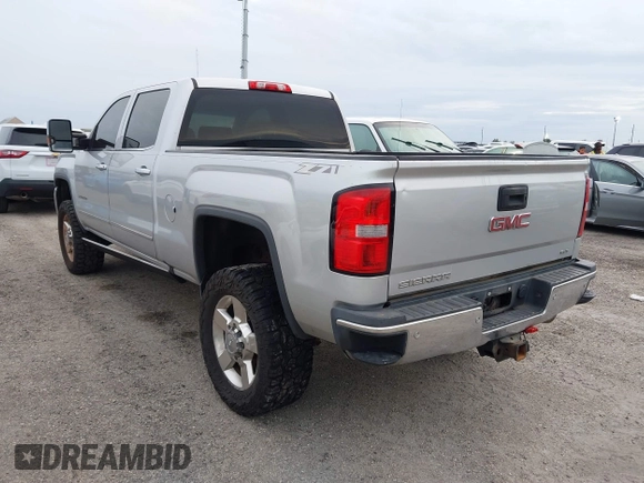2016 GMC Sierra 2500HD SLT z VIN 1GT12TE89GF183548, wystawiony jako IAAI lot #40476400 z przebiegiem 203 148 mil mil oraz . Historia ofert i sprzedaży dostępna na DreamBid. Obrazek 3.