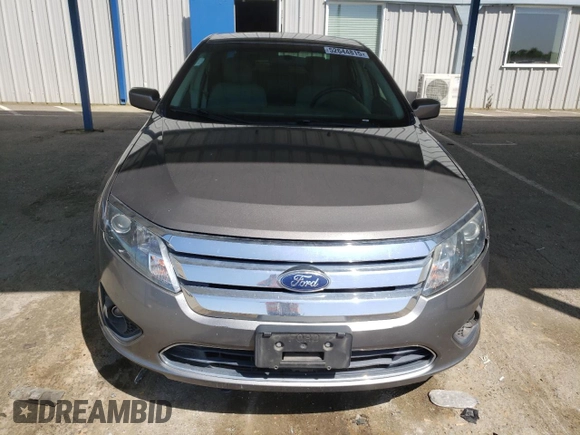 2012 Ford Fusion SE z VIN 3FAHP0HAXCR231865, wystawiony jako Copart lot #52644815 z przebiegiem 153 058 mil mil oraz Szkoda całkowita • Salvage title. Historia ofert i sprzedaży dostępna na DreamBid. Obrazek 5.