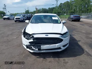 2020 Ford Fusion SE with VIN 3FA6P0H78LR237689, listed as a IAAI auction lot 42492036 with 63,303 mi miles and . Bid and sale history available at DreamBid. Image 12.