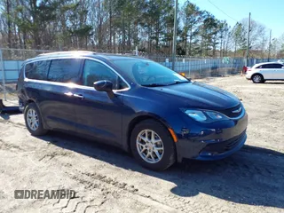 2020 Chrysler Voyager LXI with VIN 2C4RC1DG9LR148279, listed as a IAAI auction lot 41764593 with 125,201 mi miles. Bid and sale history available at carsss.com. Image 1.