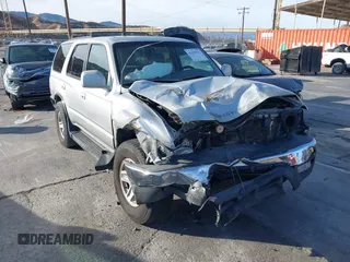 2002 Toyota 4Runner SR5 z VIN JT3GN86R920229658, wystawiony jako IAAI lot #41198511 z przebiegiem 215 386 mil mil oraz . Historia ofert i sprzedaży dostępna na DreamBid. Obrazek 1.