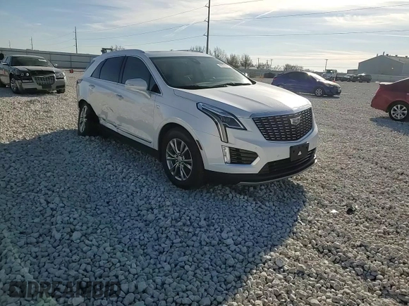2022 Cadillac XT5 FWD Premium Luxury with VIN 1GYKNCRS1NZ125487, listed as a Copart auction lot 42081675 with 67,702 mi miles and Salvage title. Bid and sale history available at DreamBid. Image 11.