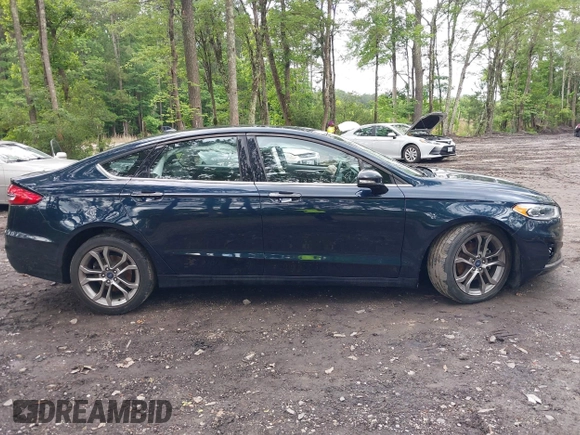 2020 Ford Fusion SEL with VIN 3FA6P0CD1LR180409, listed as a IAAI auction lot 42384311 with 39,163 mi miles and . Bid and sale history available at DreamBid. Image 13.