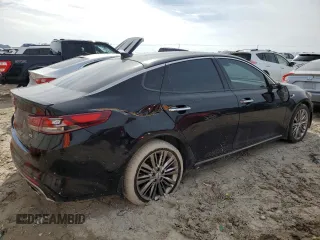 2017 Kia Optima SX Limited z VIN 5XXGV4L25HG159742, wystawiony jako Copart lot #44979005 z przebiegiem 140 289 mil mil oraz Szkoda całkowita • Salvage title. Historia ofert i sprzedaży dostępna na DreamBid. Obrazek 3.