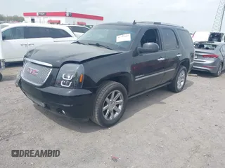2014 GMC Yukon Denali z VIN 1GKS1EEFXER113493, wystawiony jako IAAI lot #41742662 z przebiegiem 150 382 mil mil oraz . Historia ofert i sprzedaży dostępna na DreamBid. Obrazek 2.
