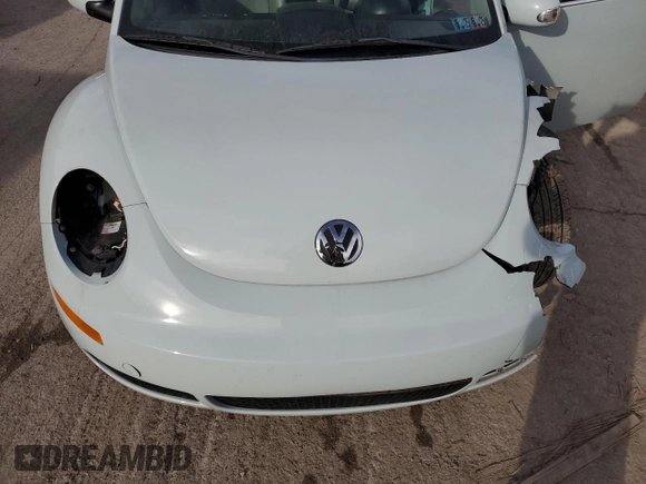 2006 Volkswagen Beetle z VIN 3VWRF31Y56M303208, wystawiony jako Copart lot #86480404 z przebiegiem 120 783 mil mil oraz Szkoda całkowita • Salvage title. Historia ofert i sprzedaży dostępna na DreamBid. Obrazek 13.