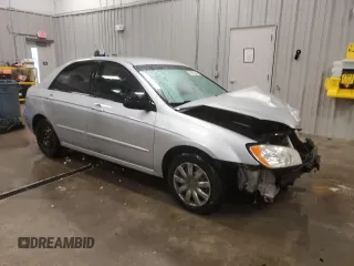 2005 Kia Spectra LX with VIN KNAFE121655148281, listed as a Copart auction lot 76677864 with 115,299 mi miles and Clean Title. Bid and sale history available at carsss.com. Image 4.