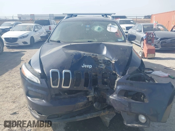 2015 Jeep Cherokee Latitude with VIN 1C4PJLCB9FW683459, listed as a IAAI auction lot 41998309 with 176,769 mi miles and . Bid and sale history available at carsss.com. Image 12.